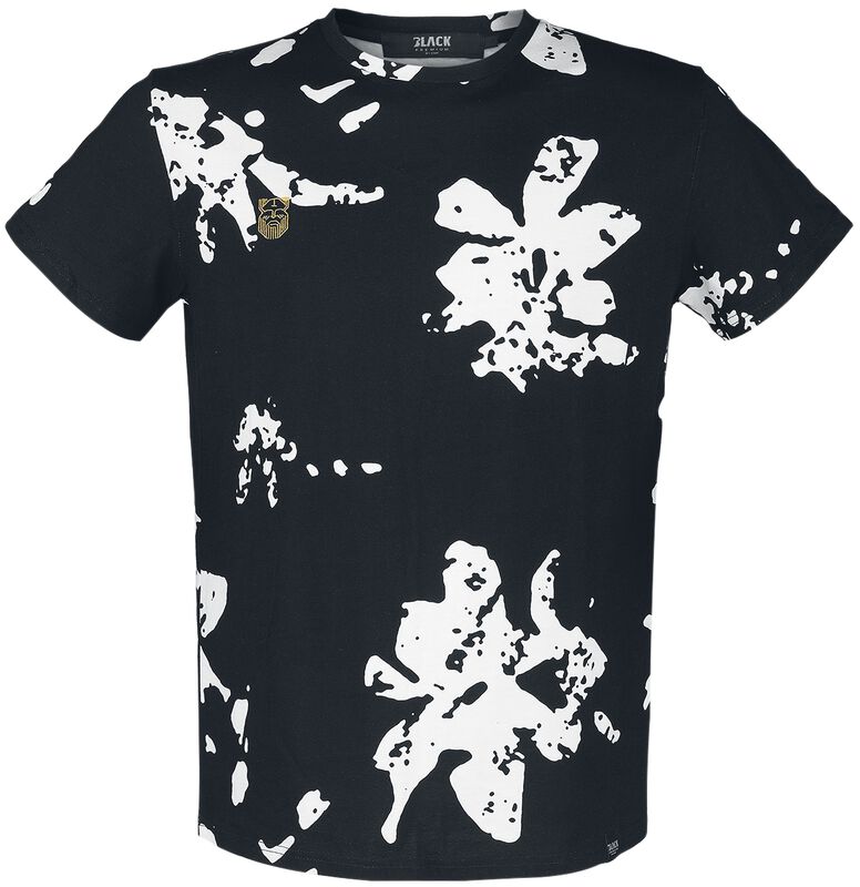 T-shirt med vita blommor och liten broderad detalj